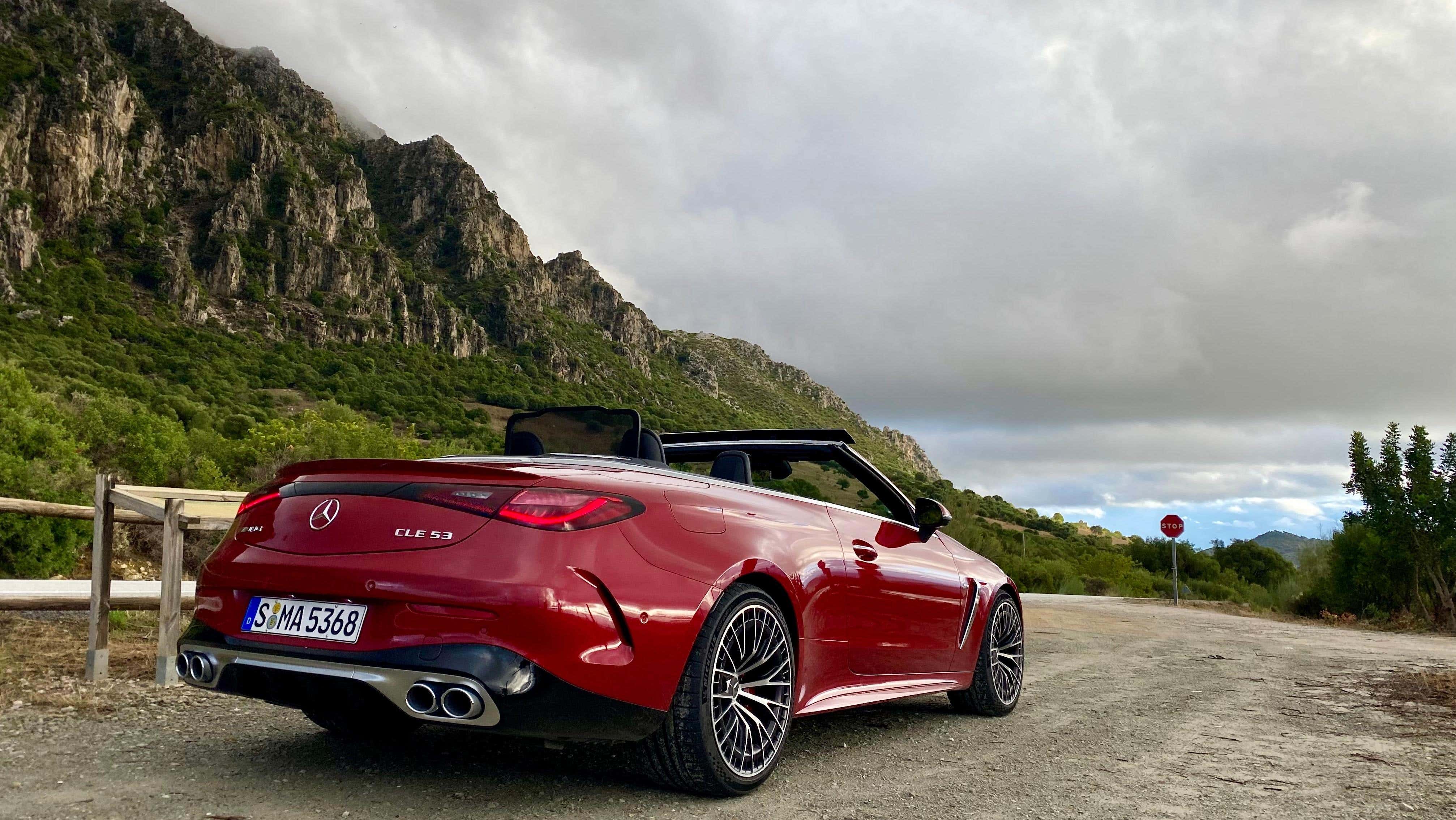 Rear quarter red CLE 53 Cabriolet in front of mountains